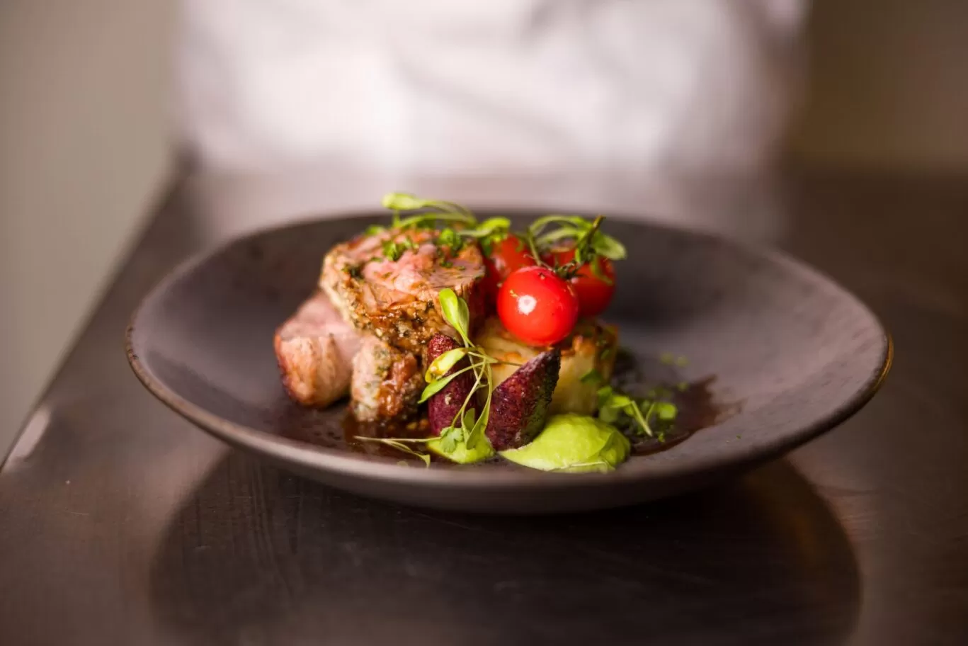 herb crusted lamb rump dish