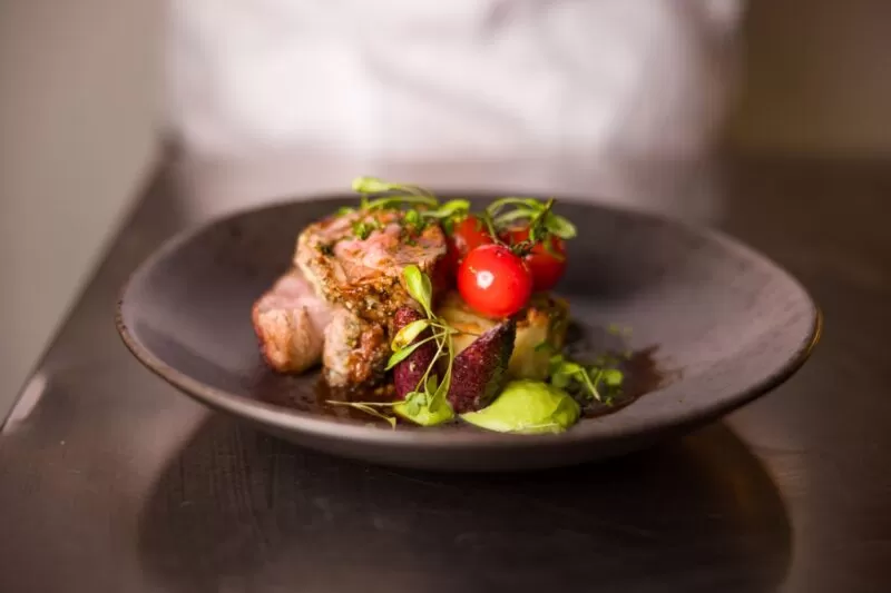 herb crusted lamb rump dish